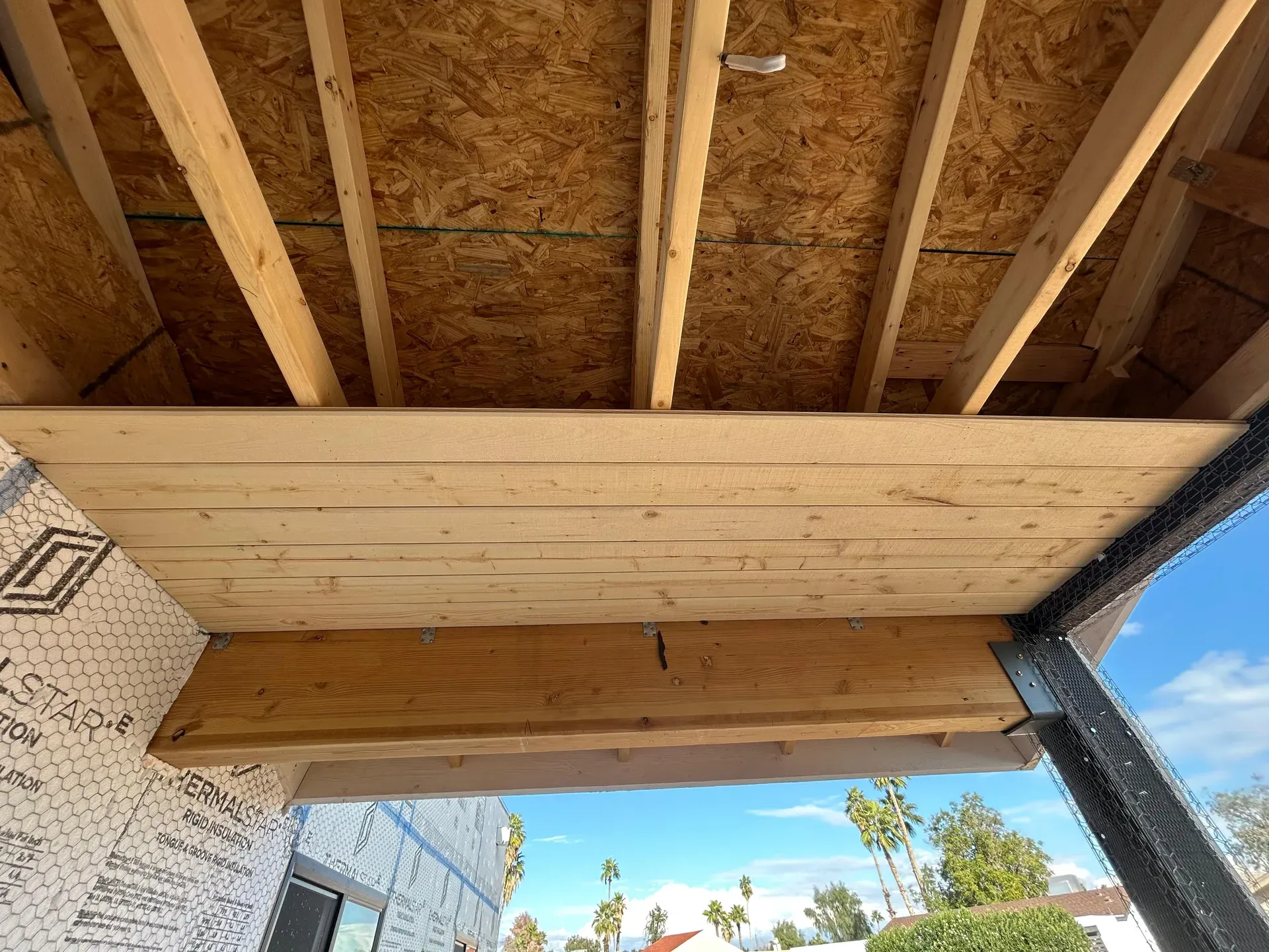 Finished tongue-and-groove plank ceiling