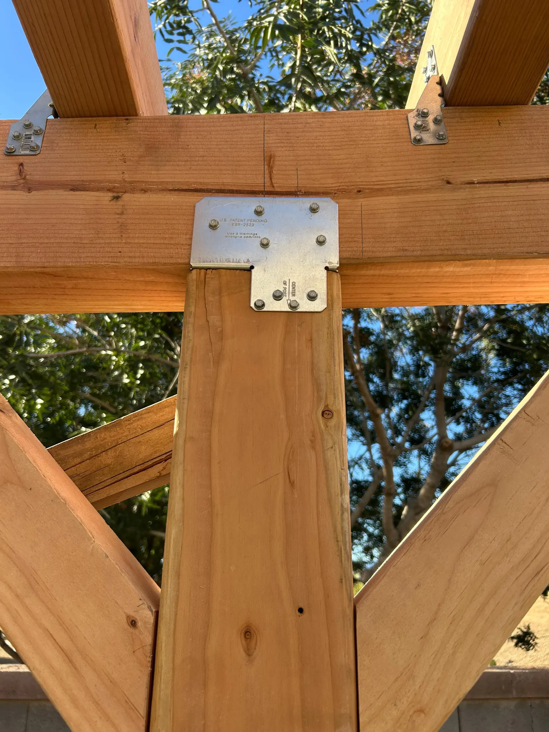 Reinforced post and beam connection
